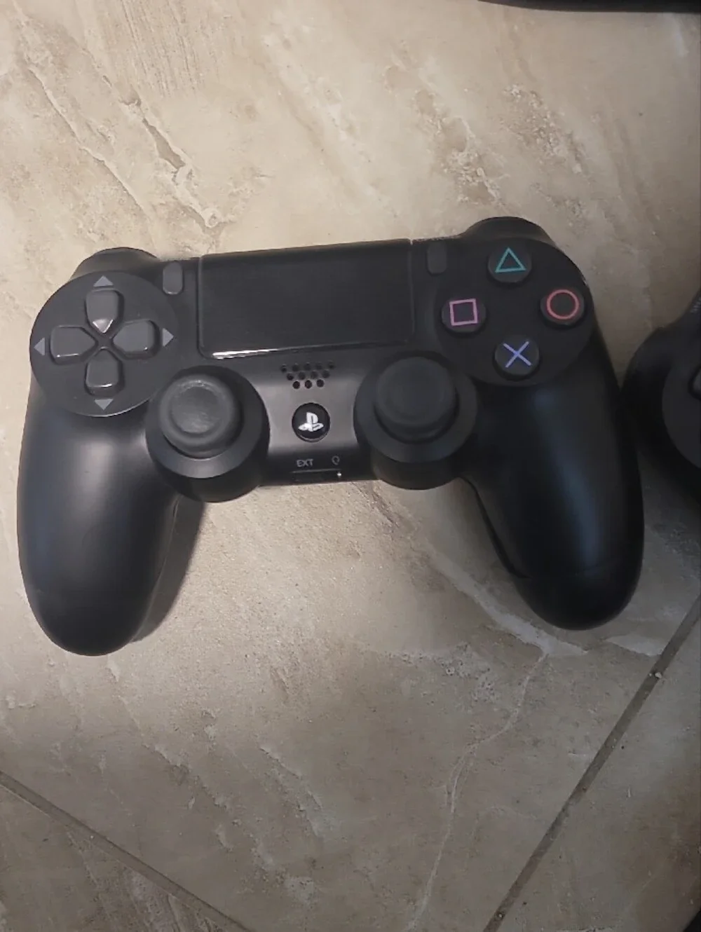 Sony Black PS4 Slim Console with Two Black DualShock Controllers